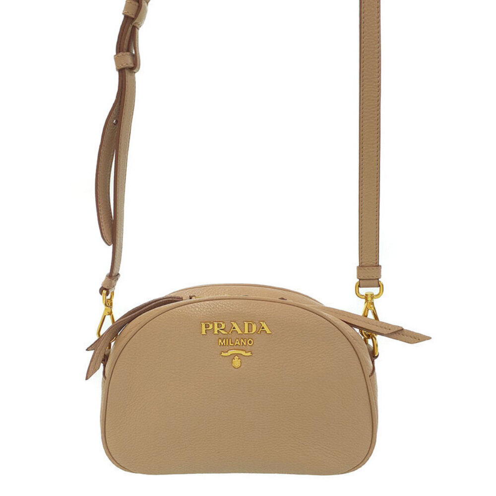 Prada Pebbled Leather Camera Bag beige Tan